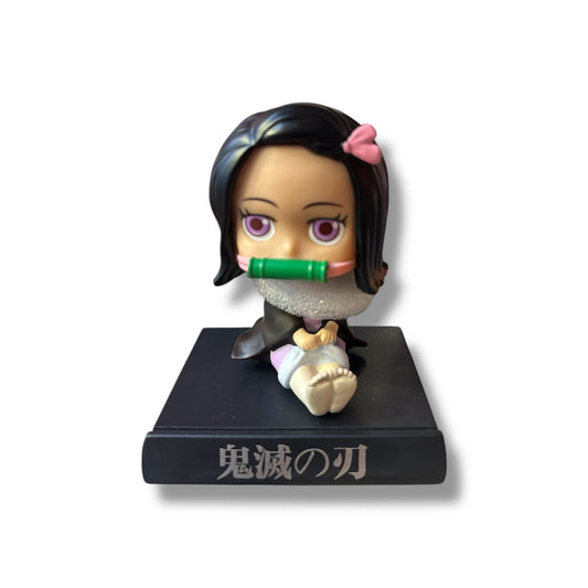 CABEZÓN Y PORTA CELULARES DE NEZUKO DE KIMETSU NO YAIBA - 12 CM APROX