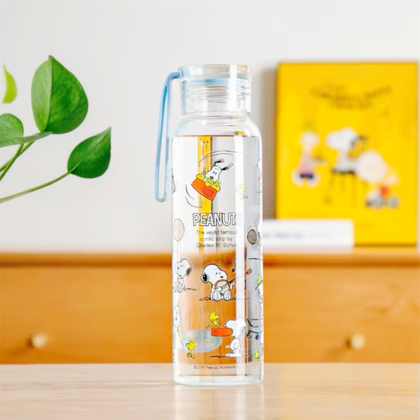 Botella de vidrio con estampado de Snoopy