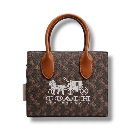 CARTERA ESTILO COACH AAA - CAFÉ