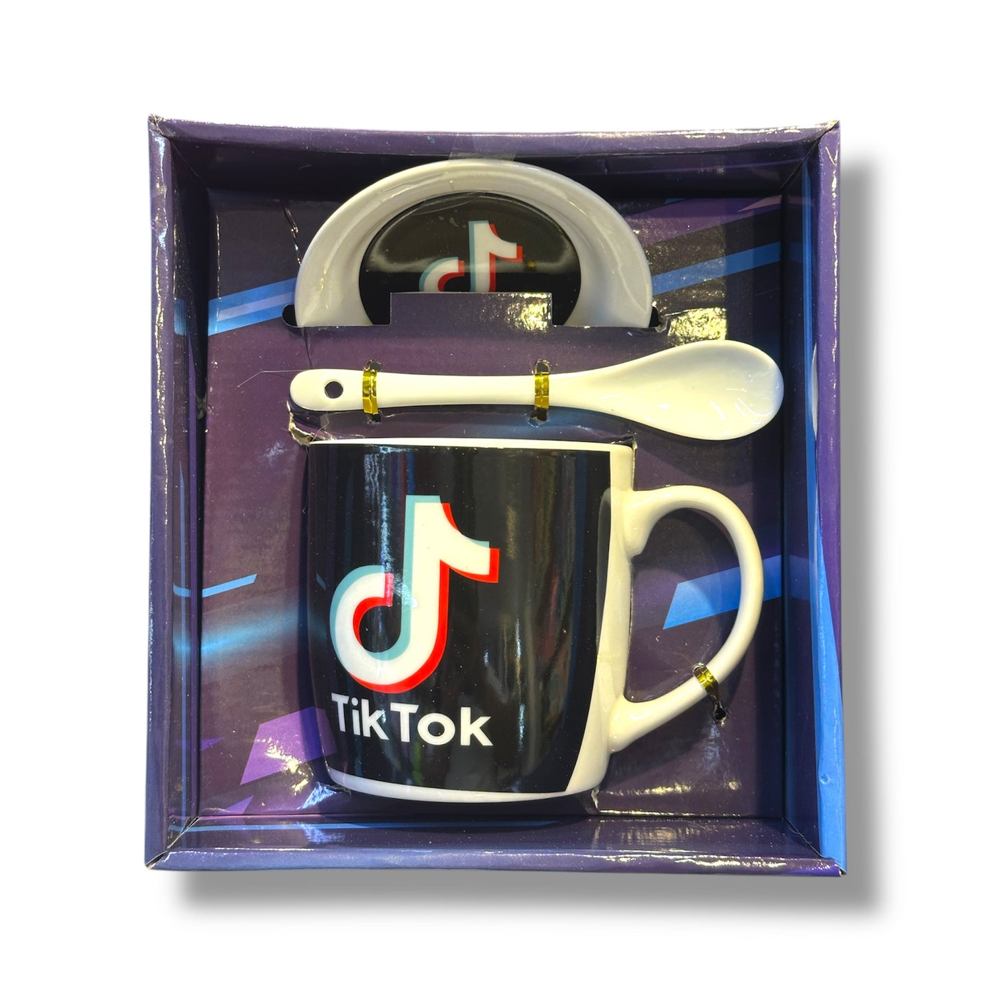 Set de taza de cerámica, cuchara y plato con diseño del logo de Tik Tok